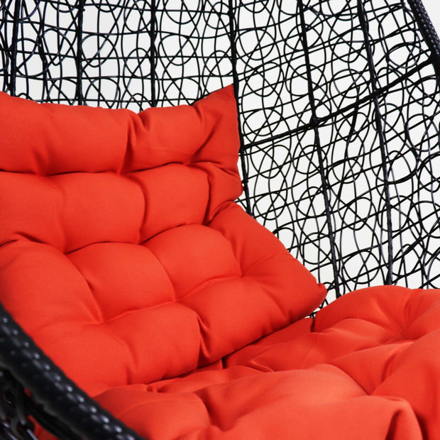 This is a product image of Black Cocoon Swing Chair Orange Cushion. It can be used as an Outdoor Furniture.