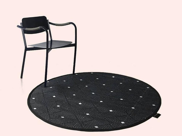 This is a product image of Ease Round Reversible Mat - Black. It can be used as an Home Accessories.
