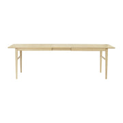 This is a product image of Hampton 6-10 Seat Extendable Dining Table in Oak Veneer. It can be used as an.