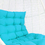 This is a product image of White Cocoon Swing Chair Blue Cushion. It can be used as an Outdoor Furniture.